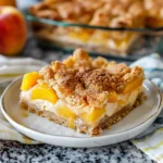 Peach Cobbler Cheesecake Bars