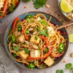 Cold Peanut Noodle Salad with crunchy bell peppers and tofu